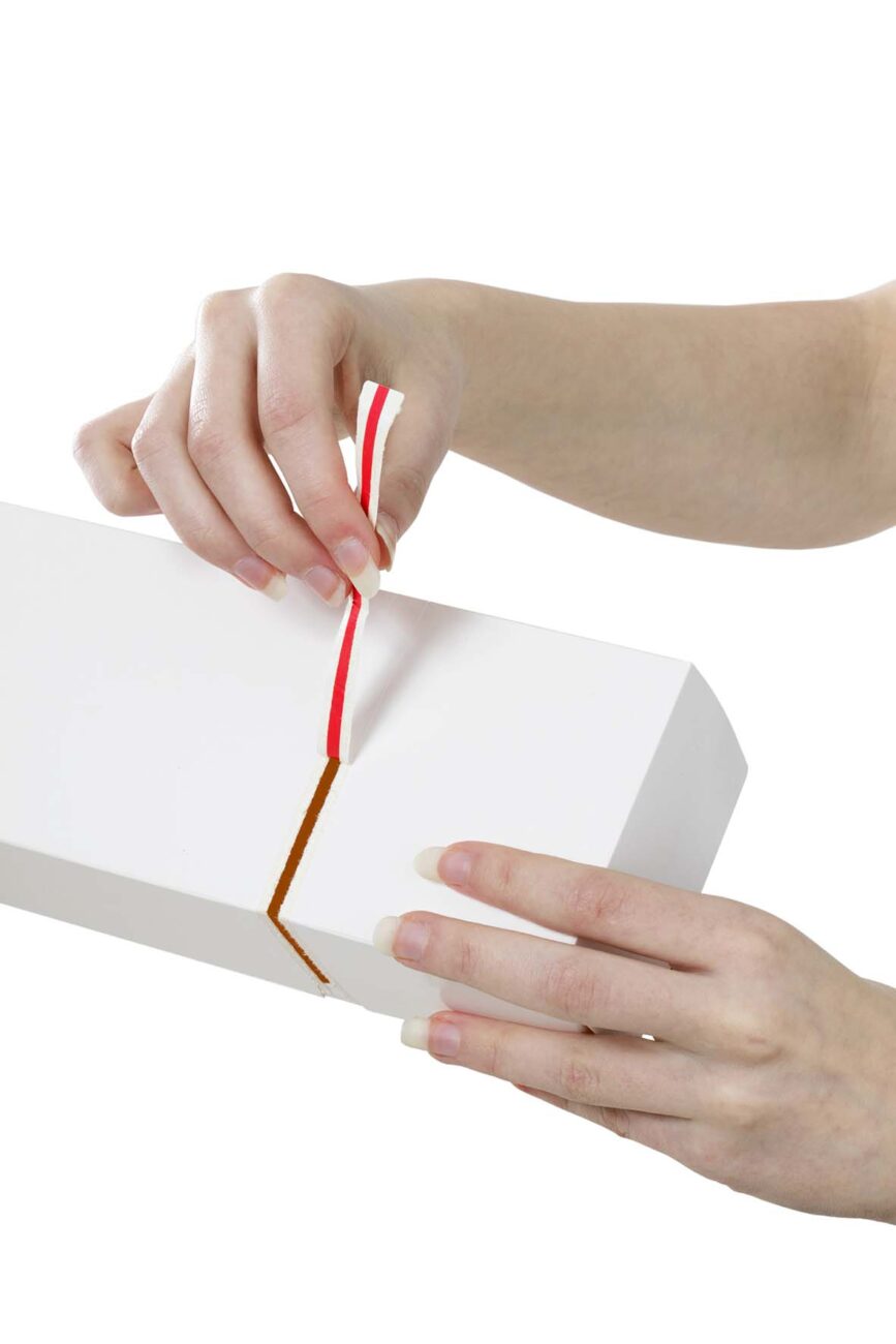 Opening a box wiith a tear strip